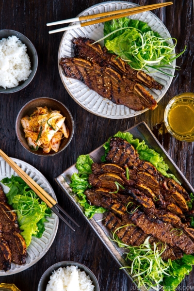 Plates containing Korean-style marinated bbq ribs.