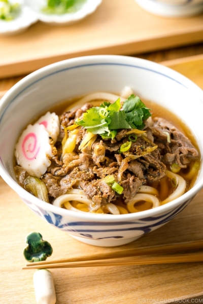 Beef udon noodle soup in a donburi bowl.