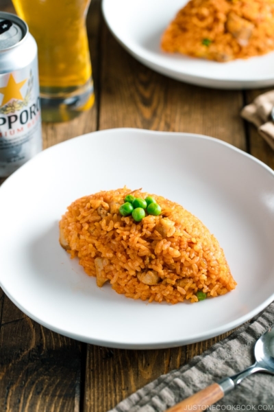 A football-shaped Chicken fried rice served on a plate