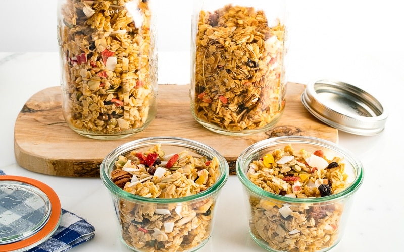 Mason jars and Weck jars containing homemade granola.