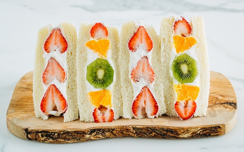 Japanese Fruit Sandwiches on a wooden board.