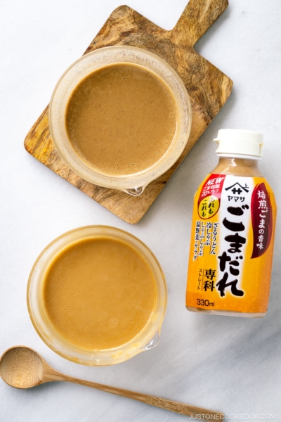 Glass bowls containing two types of Goma Dare (Japanese Sesame Sauce).