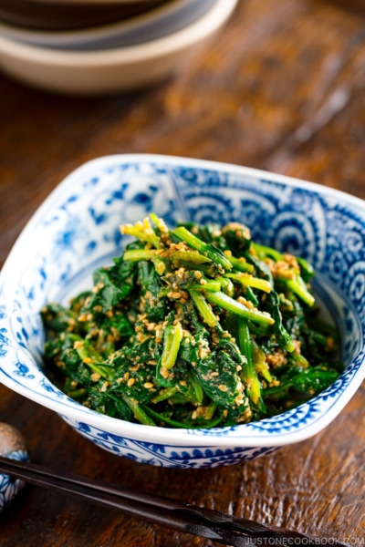 Japanese spinach salad dressed in sesame sauce served in a bowl