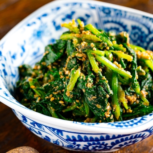 Japanese spinach salad dressed in sesame sauce served in a bowl