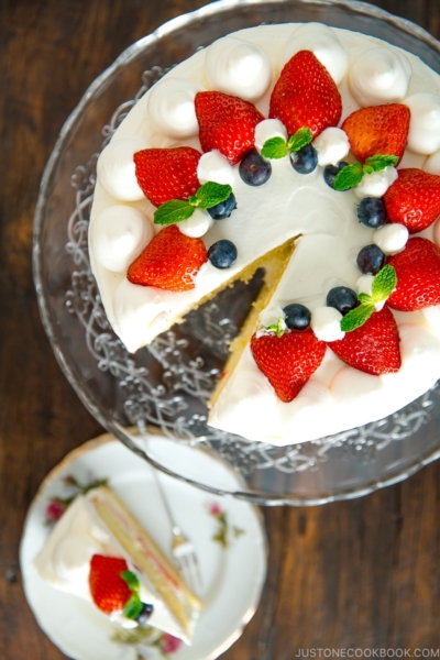 Strawberry shortcake on a cake stand.