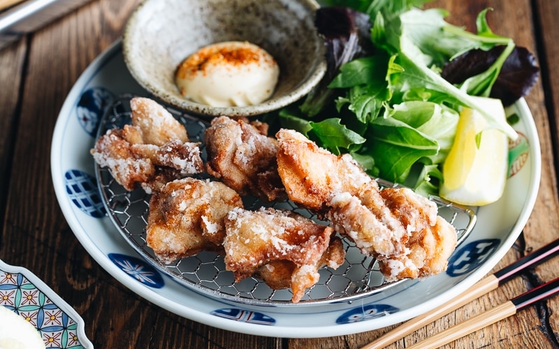 Karaage (Japanese Fried Chicken) on a Japanese plate, served with Japanese mayo.