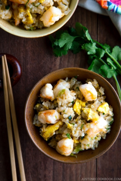 Rice bowls containing shrimp fried rice.