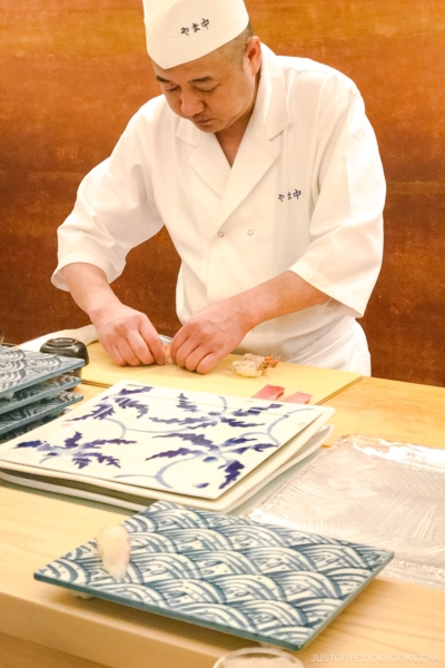 sushi chef making sushi