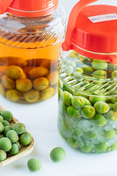 Japanese plum wine (umeshu) in a glass jar.