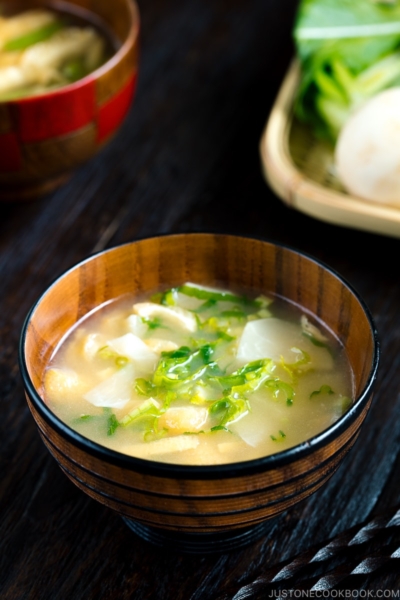 Three kinds of vegetable miso soups; each served in a Japanese wooden bowl.